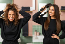 A split-screen, photorealistic image showing the before and after effects of using a heat protectant. On the left, a woman with frizzy, damaged hair clutches her head in frustration. On the right, the same woman, now with smooth, healthy hair, confidently blow-dries it with a round brush. The bathroom has a modern aesthetic with sage green tiles and dusty rose accents.