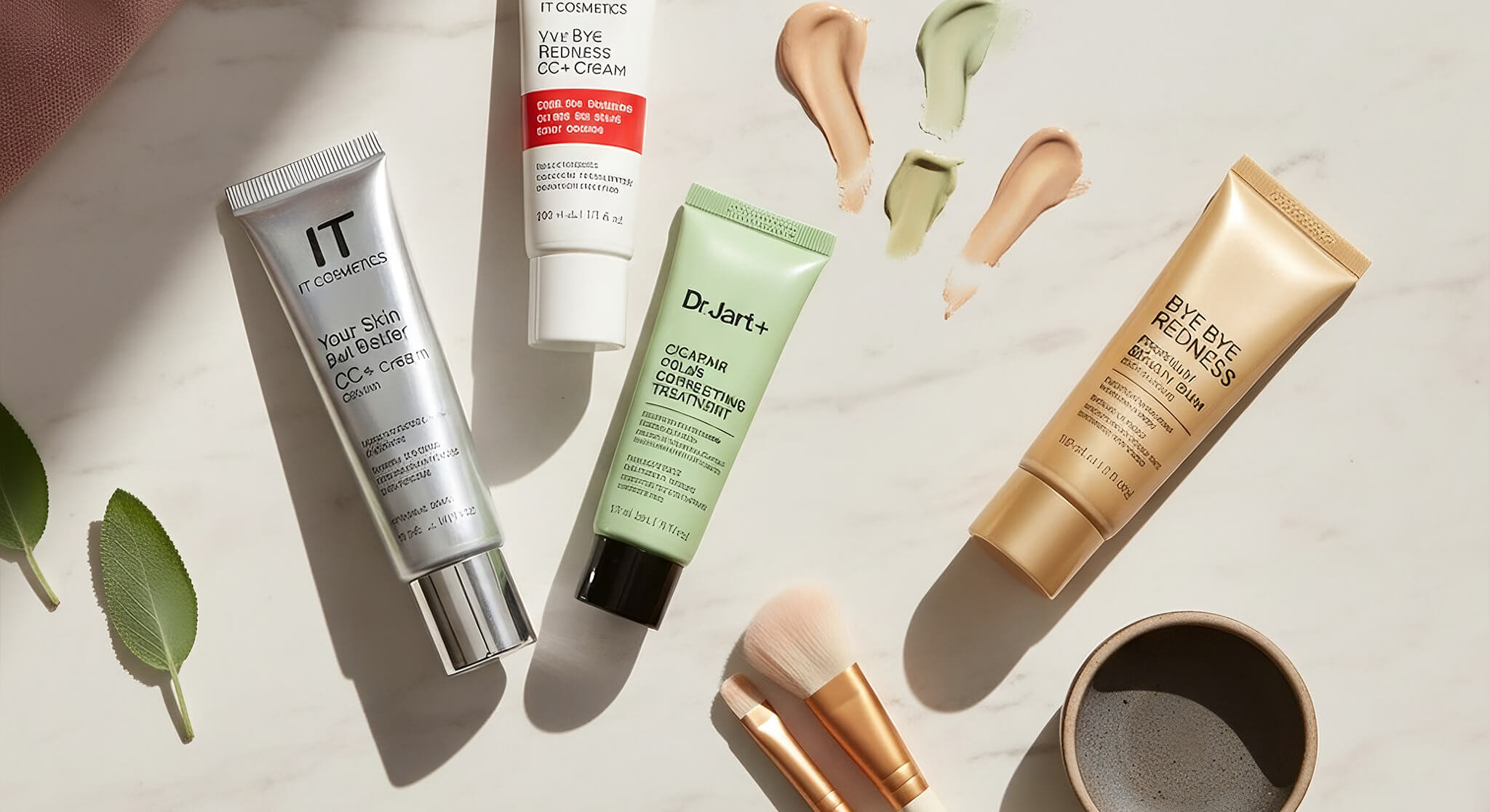 A side-by-side comparison of IT Cosmetics CC cream and Dr. Jart+ BB cream, elegantly displayed on a vanity to showcase options for lightweight coverage.