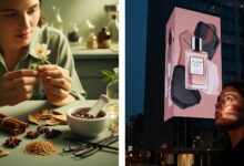 On the left, a woman in a sage green shirt is in a perfumer's lab, intently studying a small white flower. In front of her is a collection of natural ingredients like cinnamon sticks, star anise, and vanilla beans. On the right, a woman in a dark shirt looks up in awe at a large, glamorous perfume ad on the side of a skyscraper at night. The ad features a sleek perfume bottle against a background of dusty rose and charcoal.