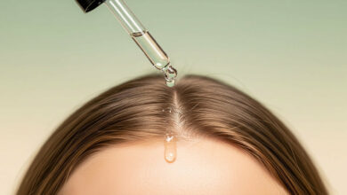 A guide to scalp health for stronger, healthier hair, showing a close-up of a serum dropper applying product to a clean scalp to achieve healthier hair.