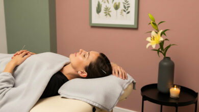 Woman undergoing acupuncture treatment, with needles gently placed on her scalp, in a tranquil room with dusty rose and sage green walls, suggesting relief for seasonal hair loss.